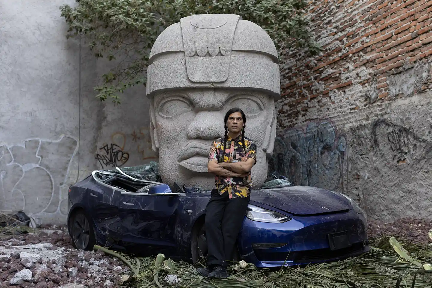 "Tesla Crushed by an Olmec Head" by Chavis Mármol: